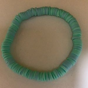 I’m selling a blue clay bead bracelet
